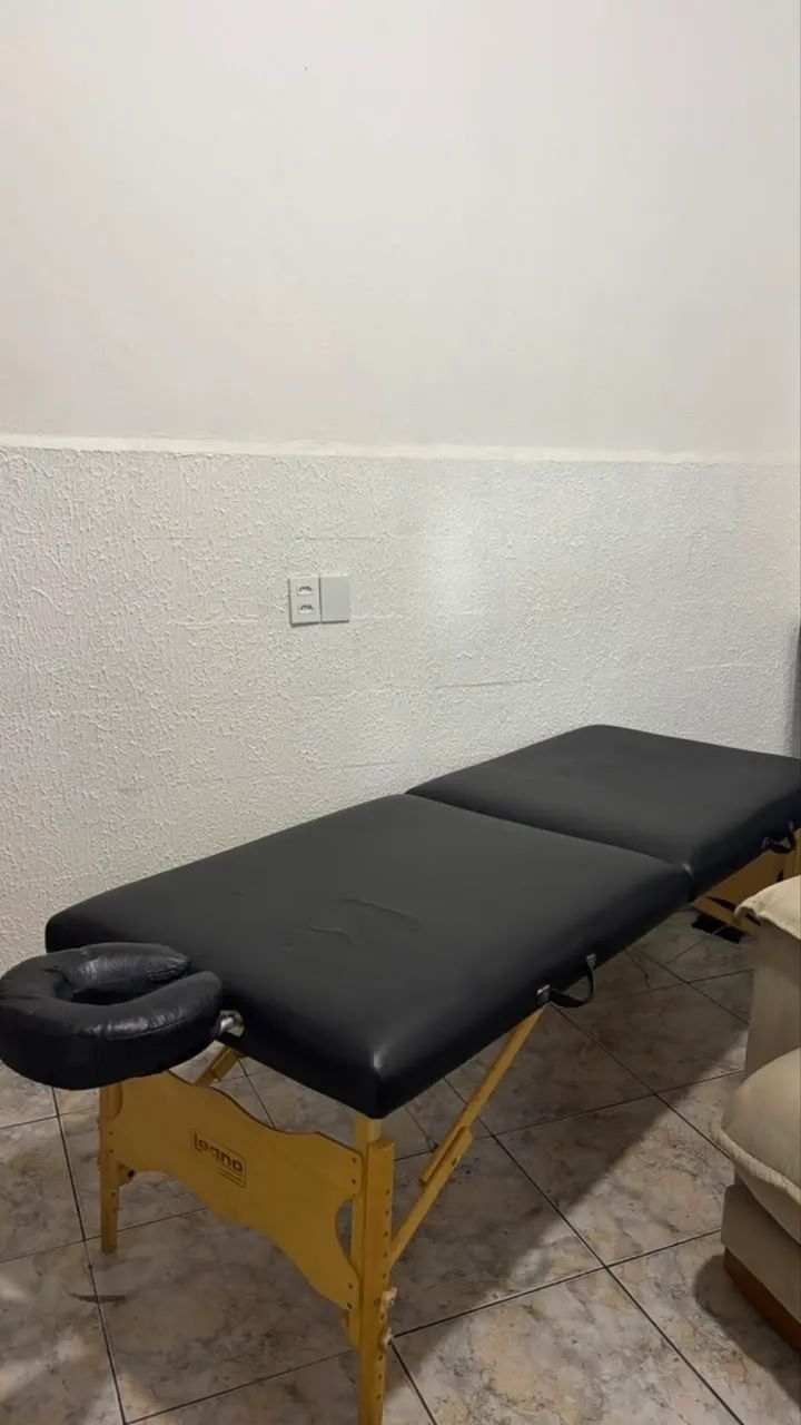 Maca de massagem com ajuste de altura.