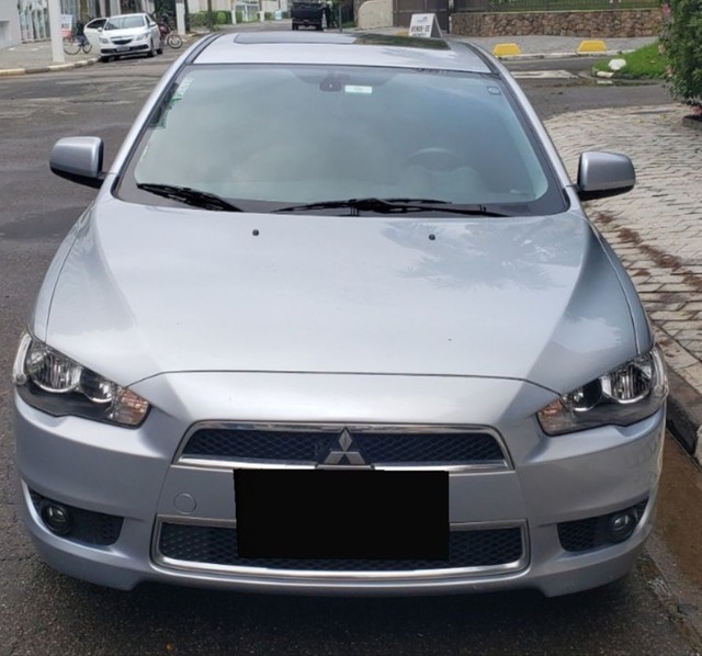 Mitsubishi Lancer HLE (com teto solar)