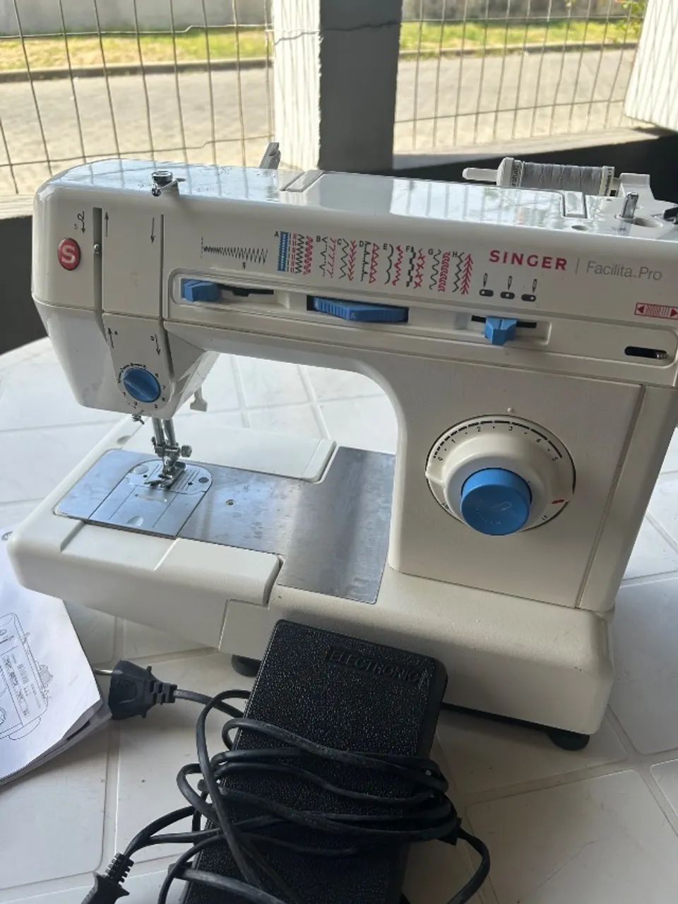 Máquina de costura 64298464636545120