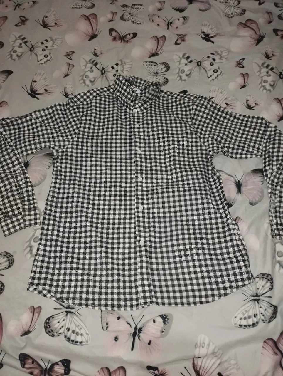 Camisa xadrez branca e preta
