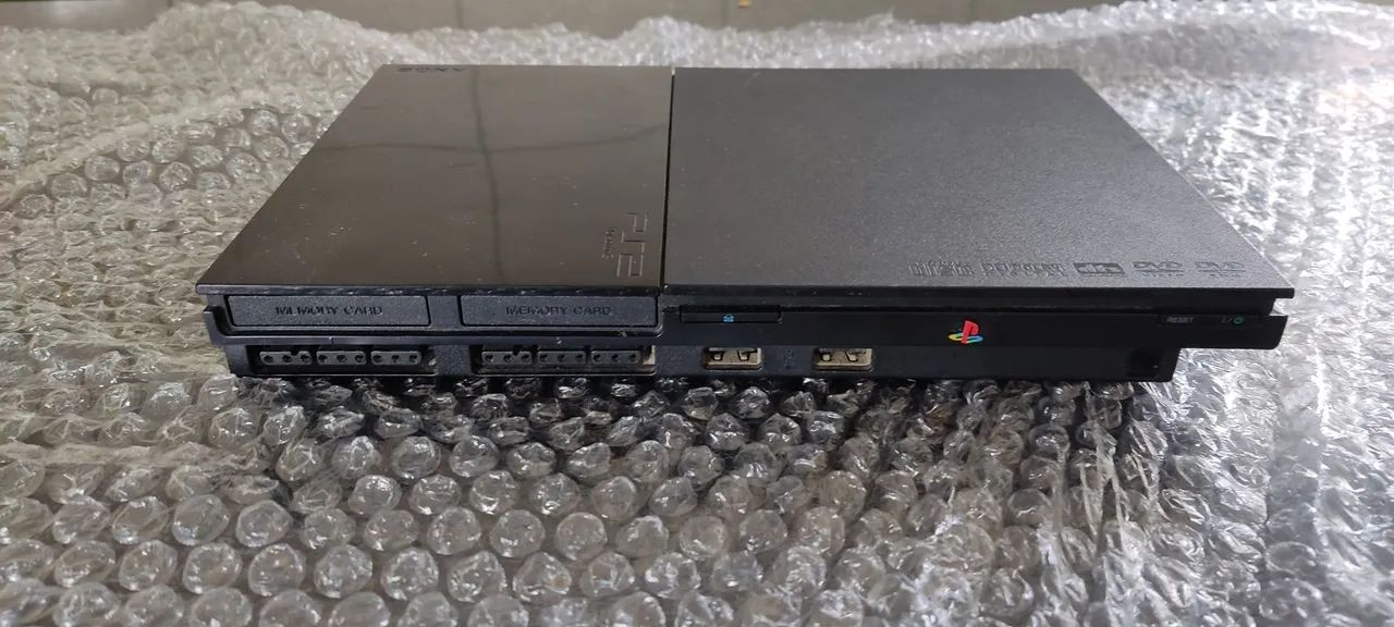 Playstation 2 Slim + 20 cds de jogos 