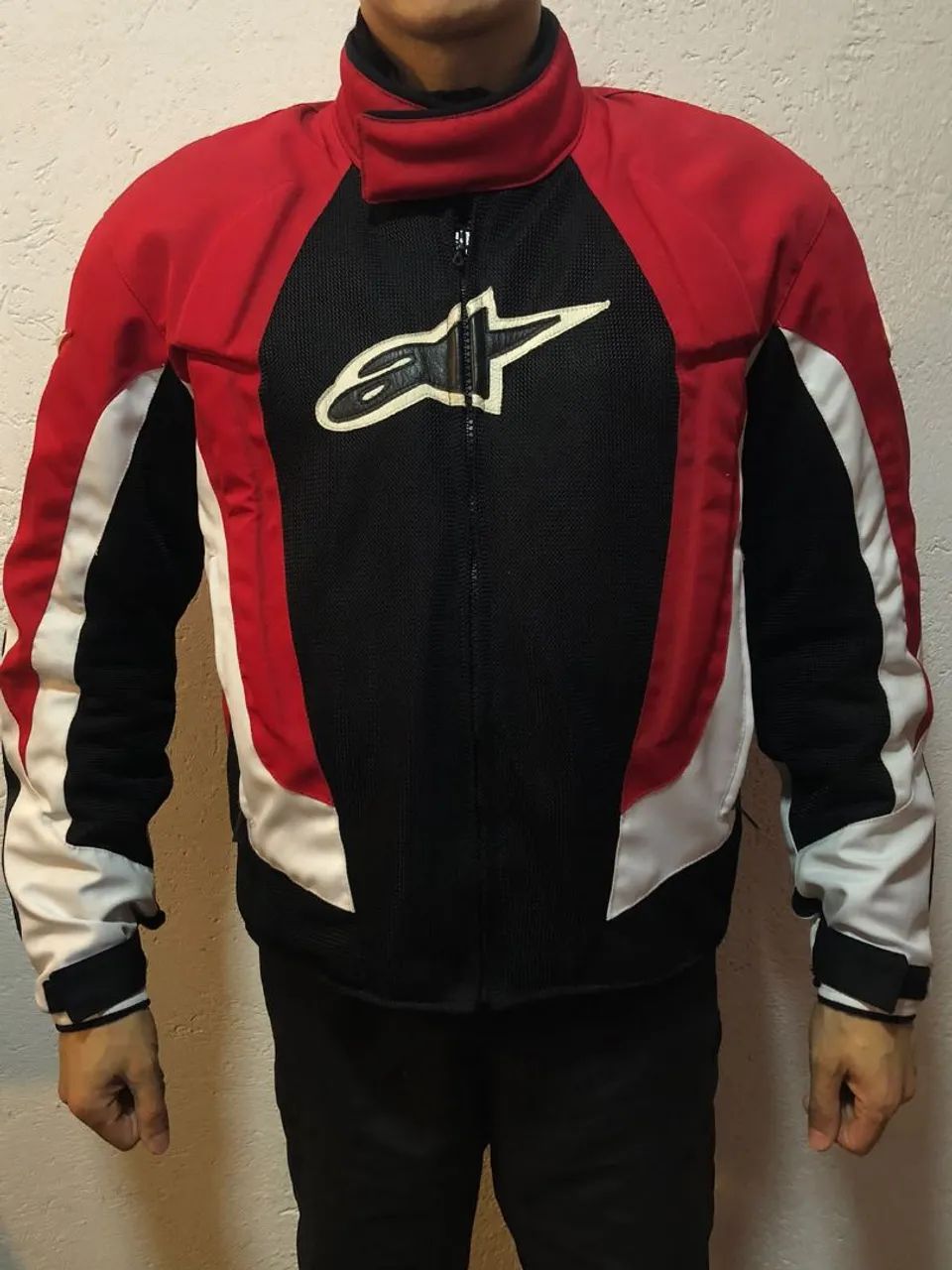 Jaqueta e calça de moto. 