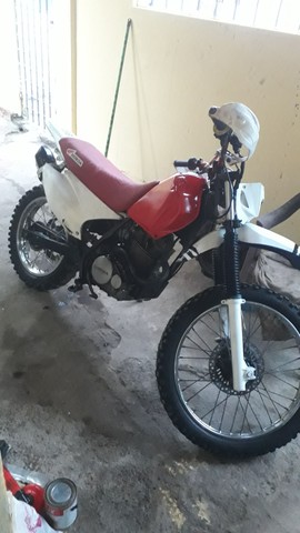VENDO UMA NX 200 VALOR $2300 ACEITO TROCA EM OUTRA MOTO LEIA O ANÚNCIO