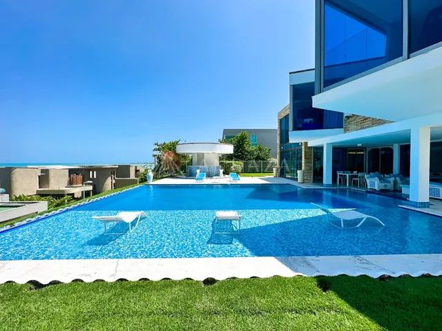 Casa de cinema com vista panorâmica do mar em condomínio fechado. (Aceita PERMUTA por imóv