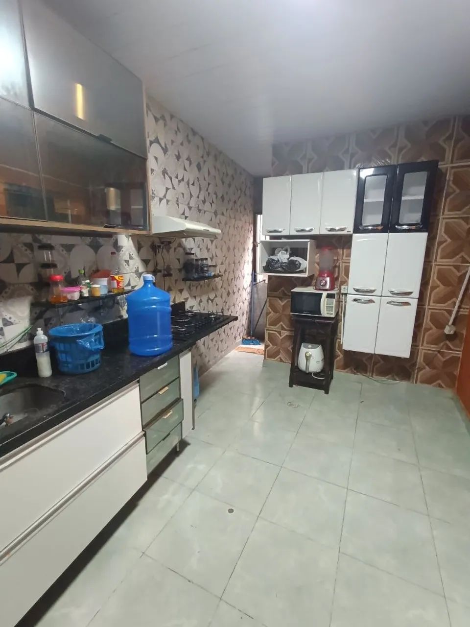 //Casa com 2 Qrts e garagem no Lírio do Vale 