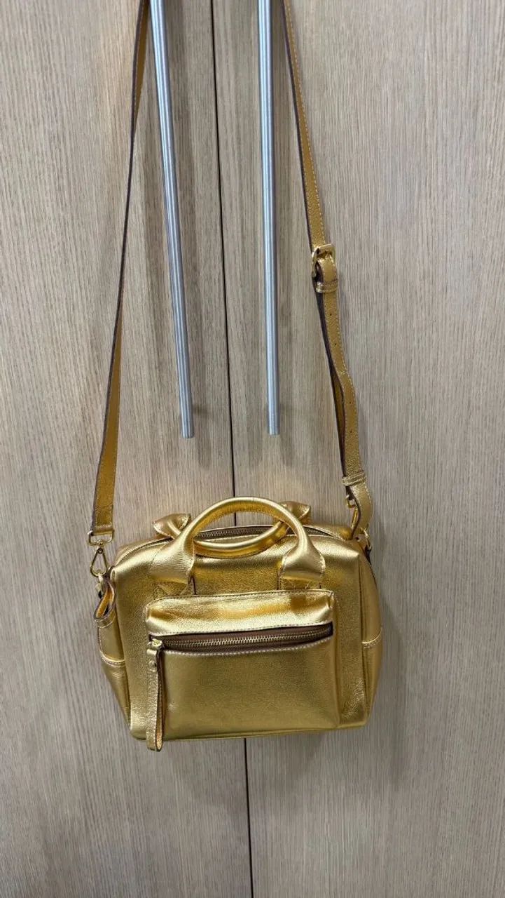 Bolsa dourada feminina 