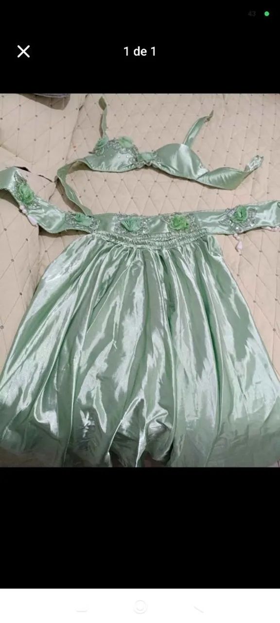 Veste se roupa do ventre verde