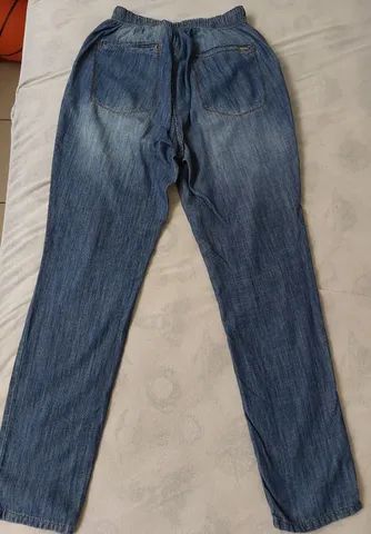 Calca jeans tamanho 42 estado de nova - Foto 4