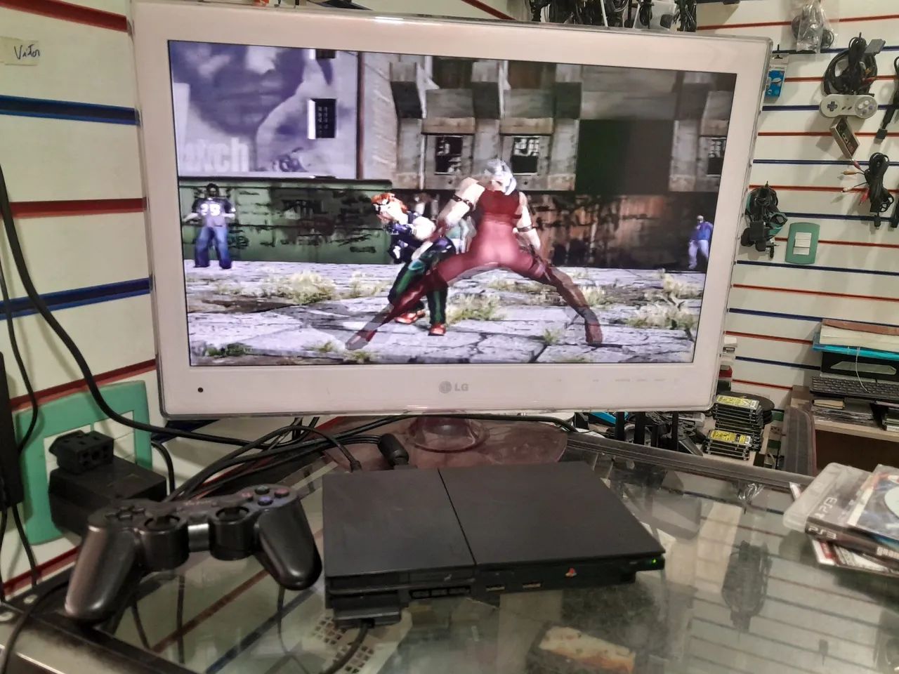 Playstation 2 slim + 1 Controle + 3 jogos aceito cartão de crédito cel 19- * 