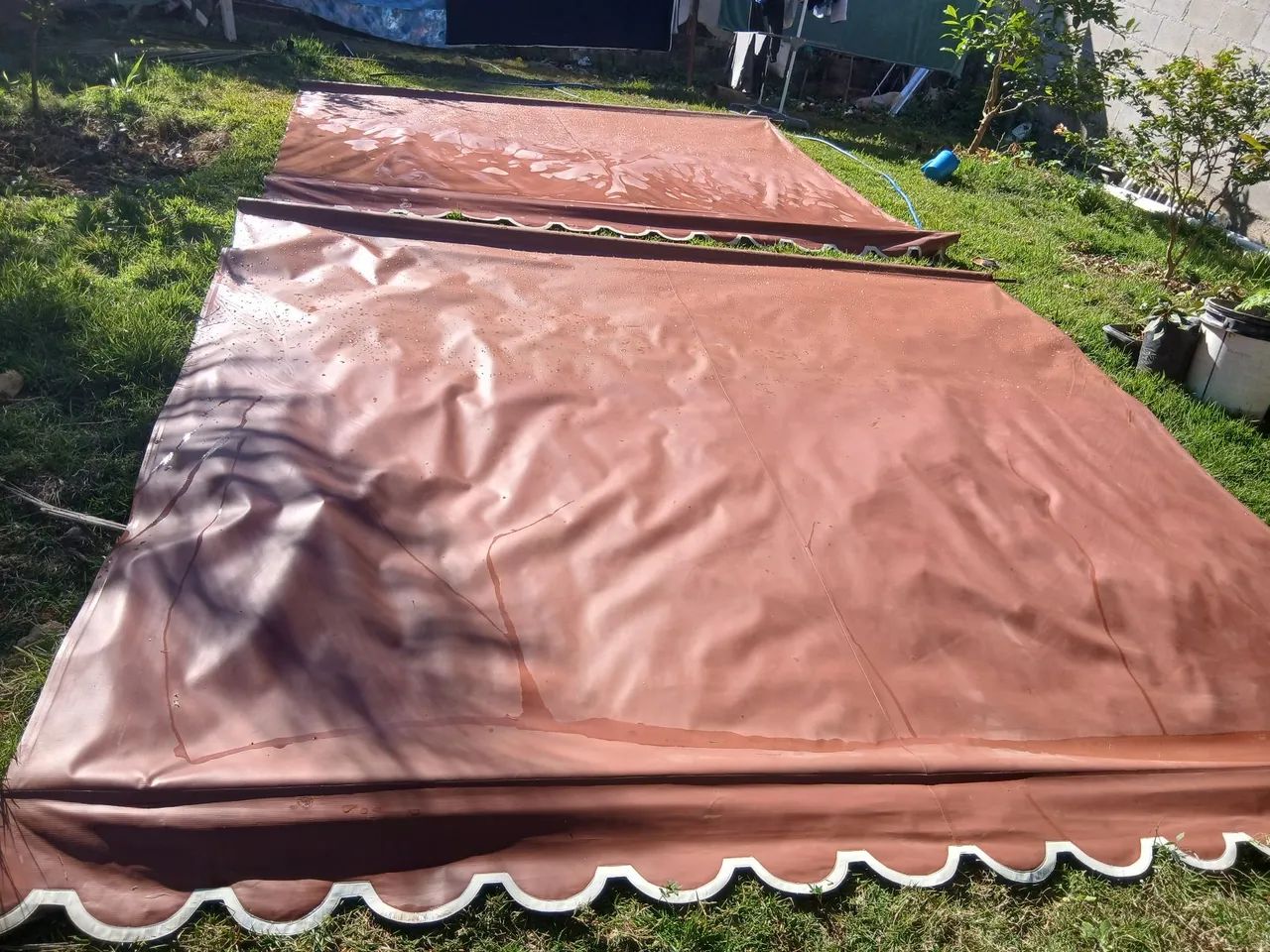 Toldo de lona com 2 braços e molas