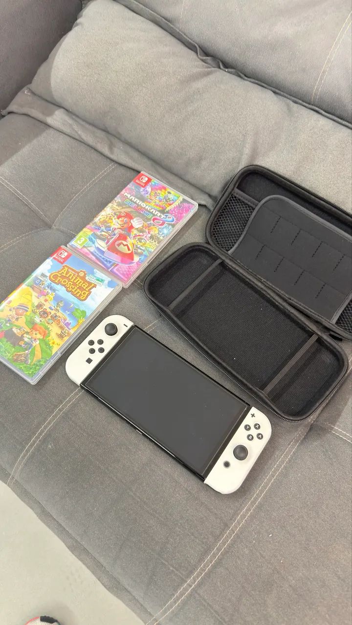 Nintendo Switch OLED + 2 Jogos - Foto 2