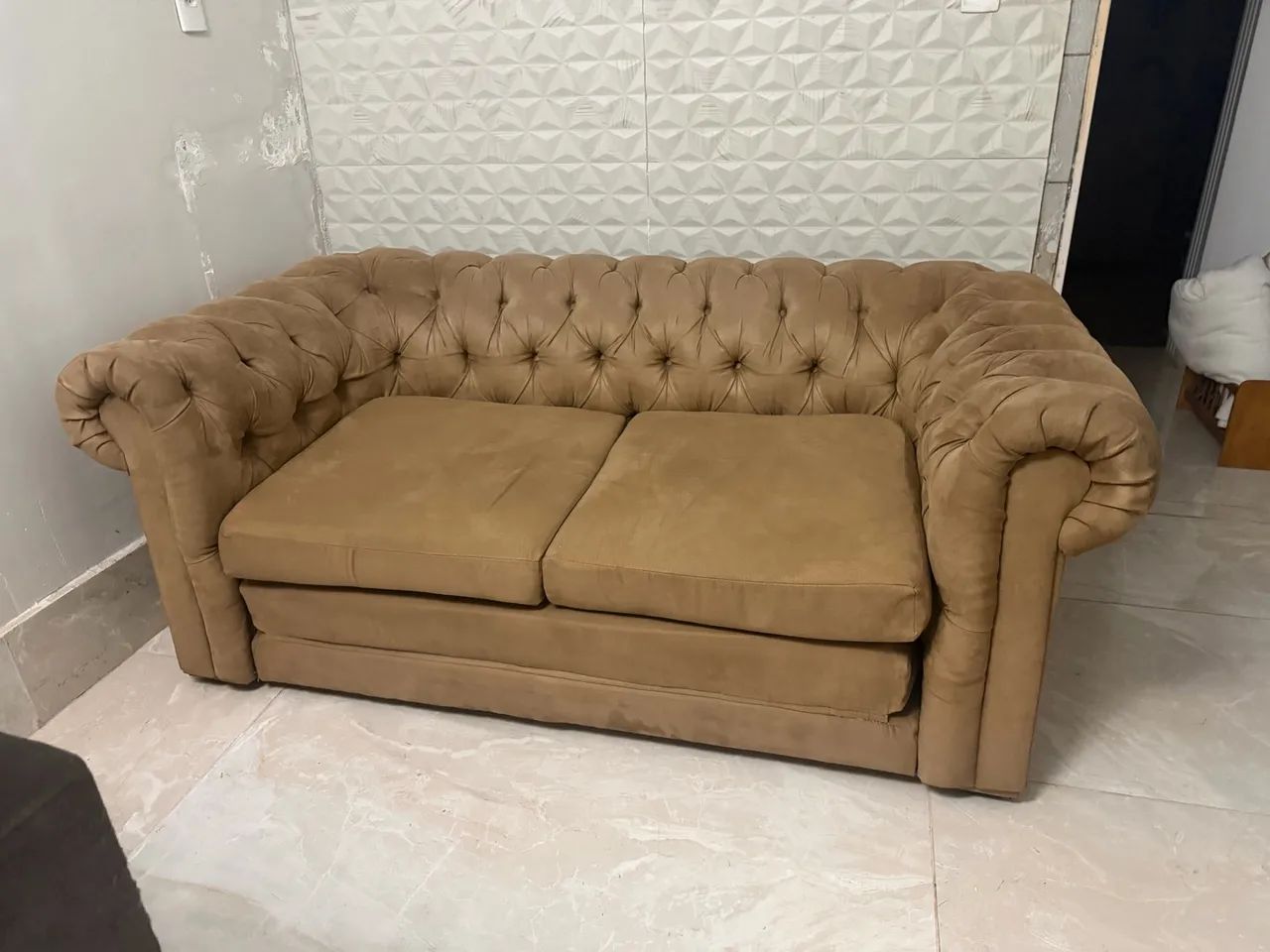 Sofá chesterfield