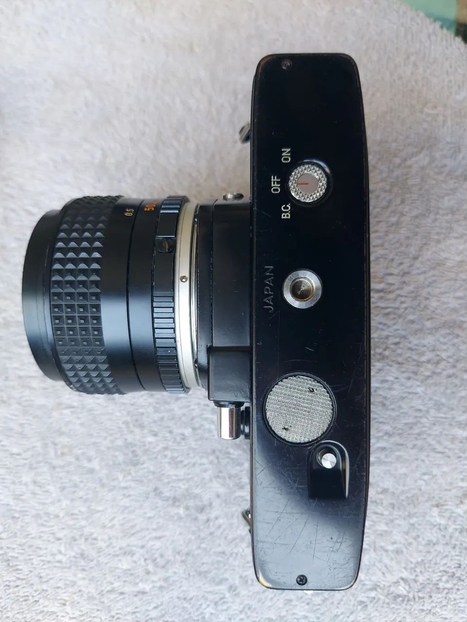 Câmera Minolta SRT 102 funcionando e com vários itens acompanhando.  - Foto 4