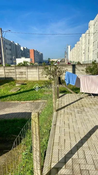 Auxliadora Predial vende Apartamento 2 dormitórios térreo com pátio - Foto 5