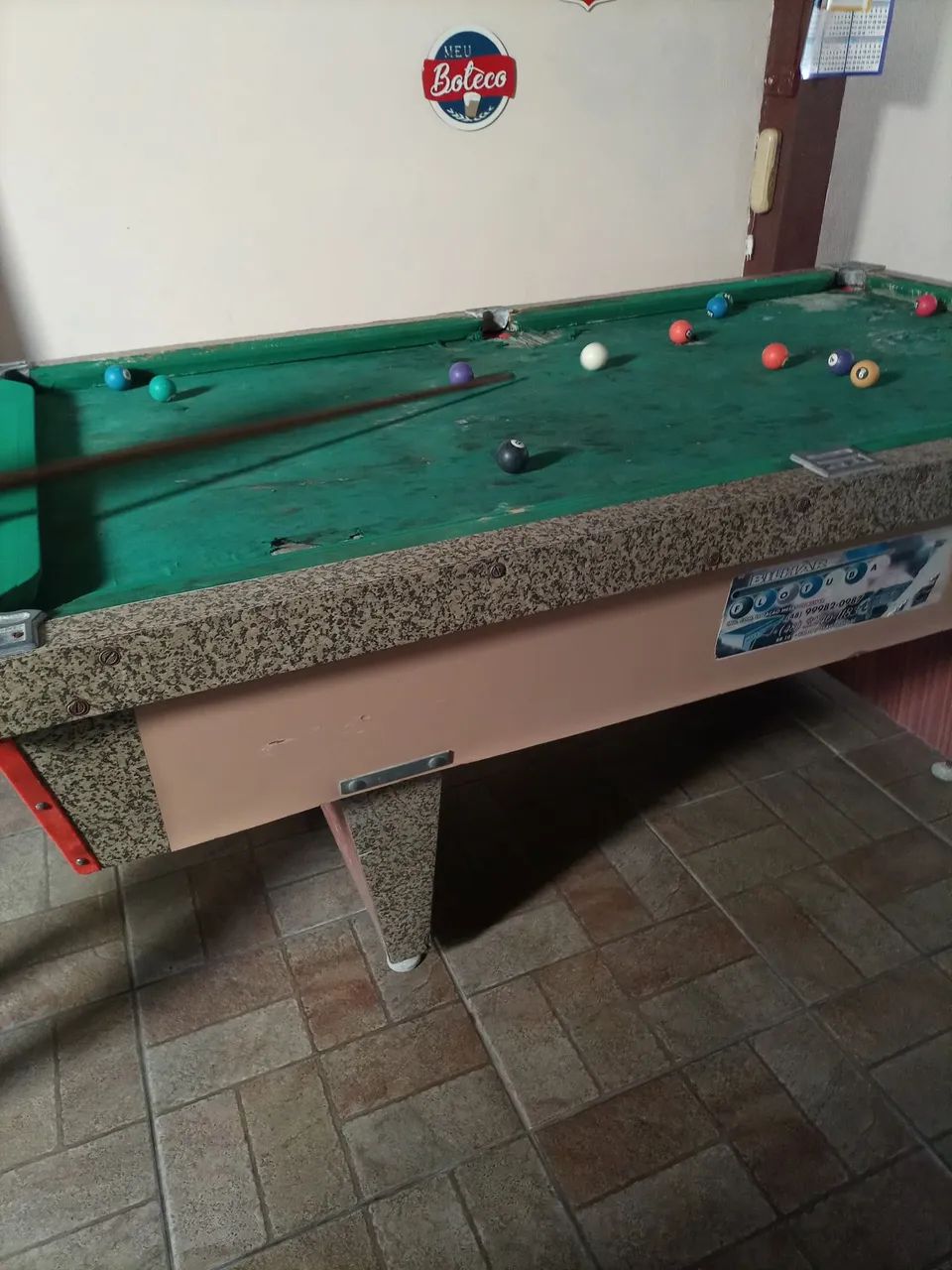 Selling a pool table with cues, balls and rack64315086687617124