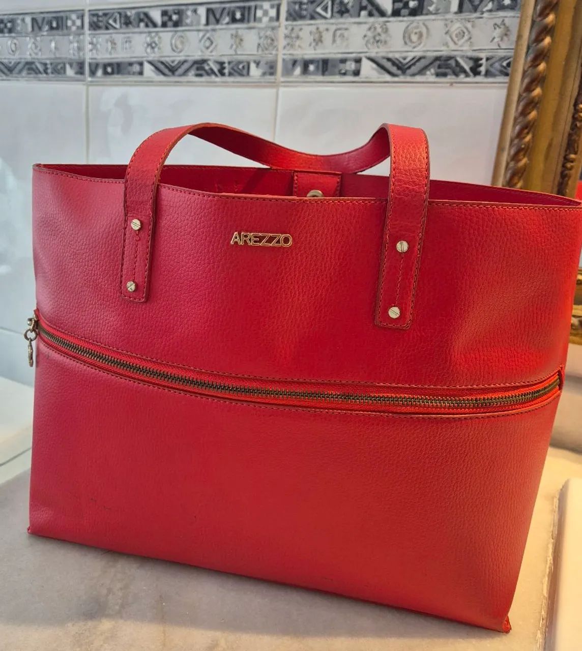 Bolsa de couro Arezzo cor Rubi