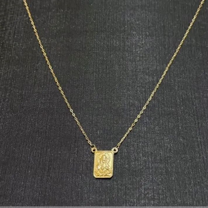 ESCAPULÁRIO CARTIER EM OURO 18k 750
