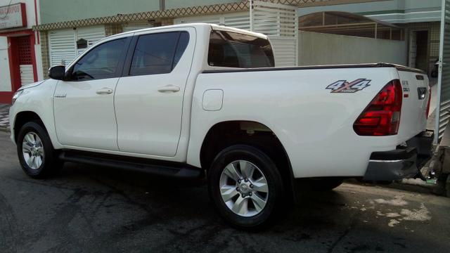 Hilux srv aut DIESEL 2018 zerada !!! - Foto 8