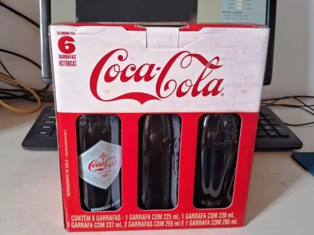 Coleção de garrafas vintage da Coca Cola