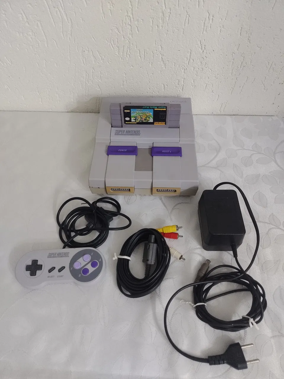 Super Nintendo com Mario Kart