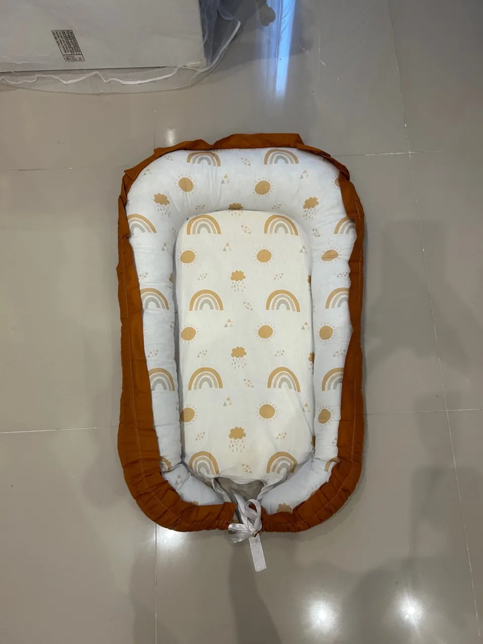 Ninho redutor de bebê
