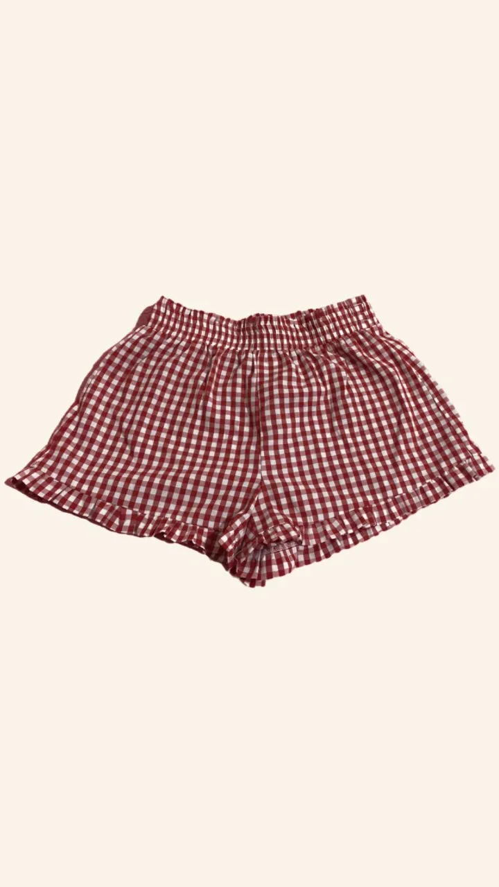 Shorts xadrez vermelho com babado