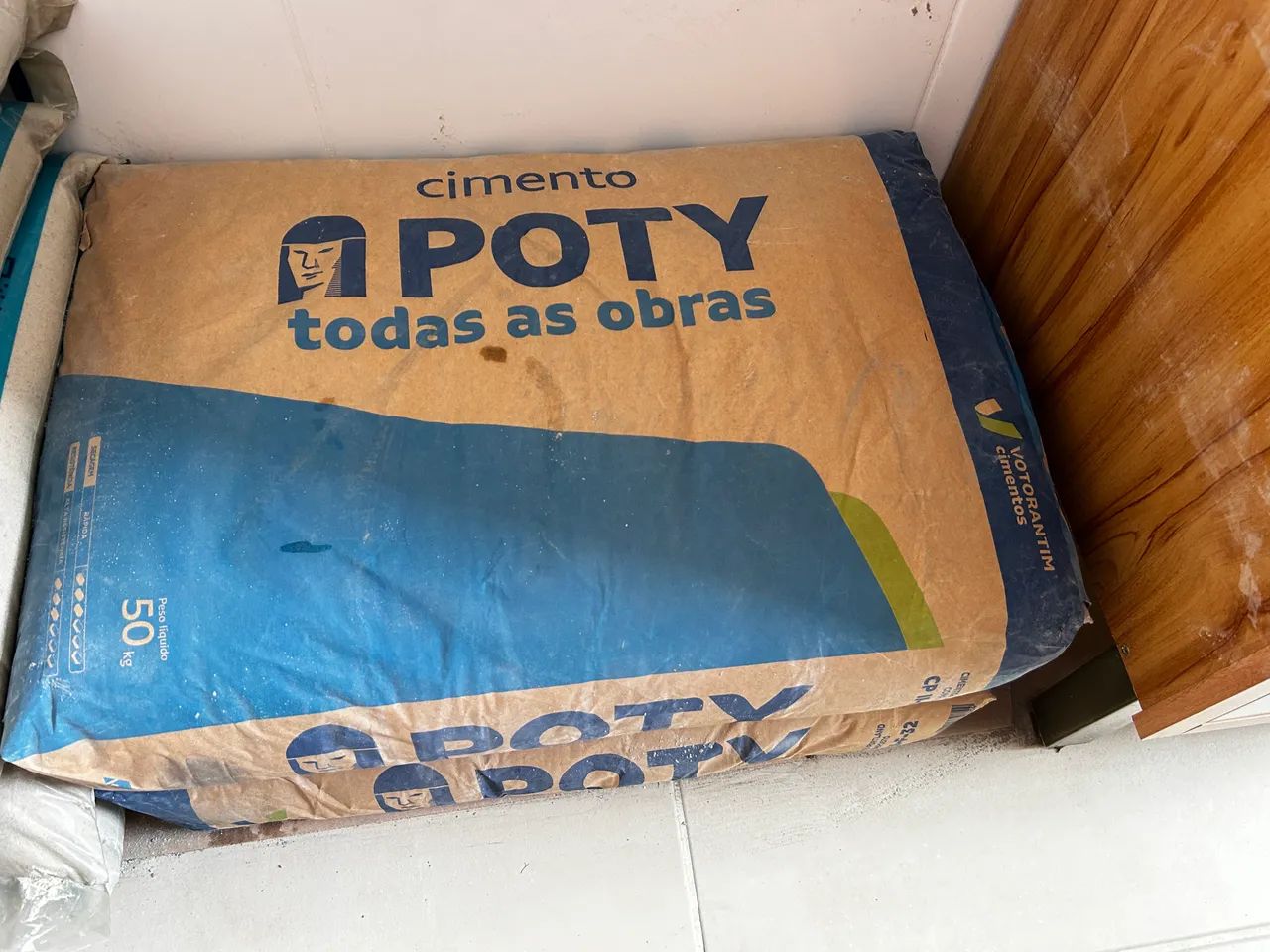 2 sacos de cimento 50kg cada 