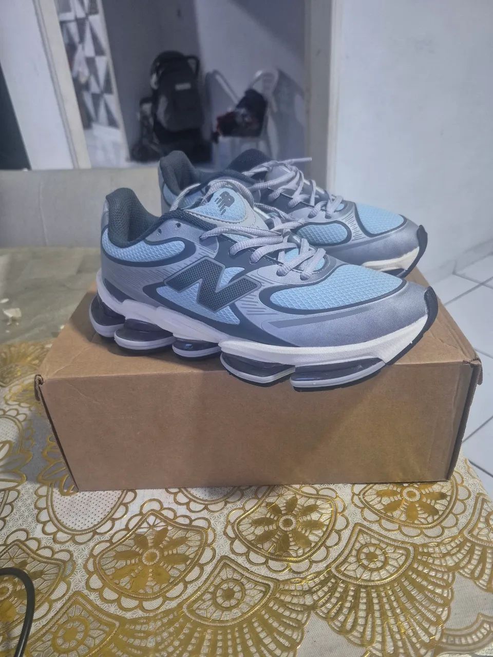 Sapatos NB