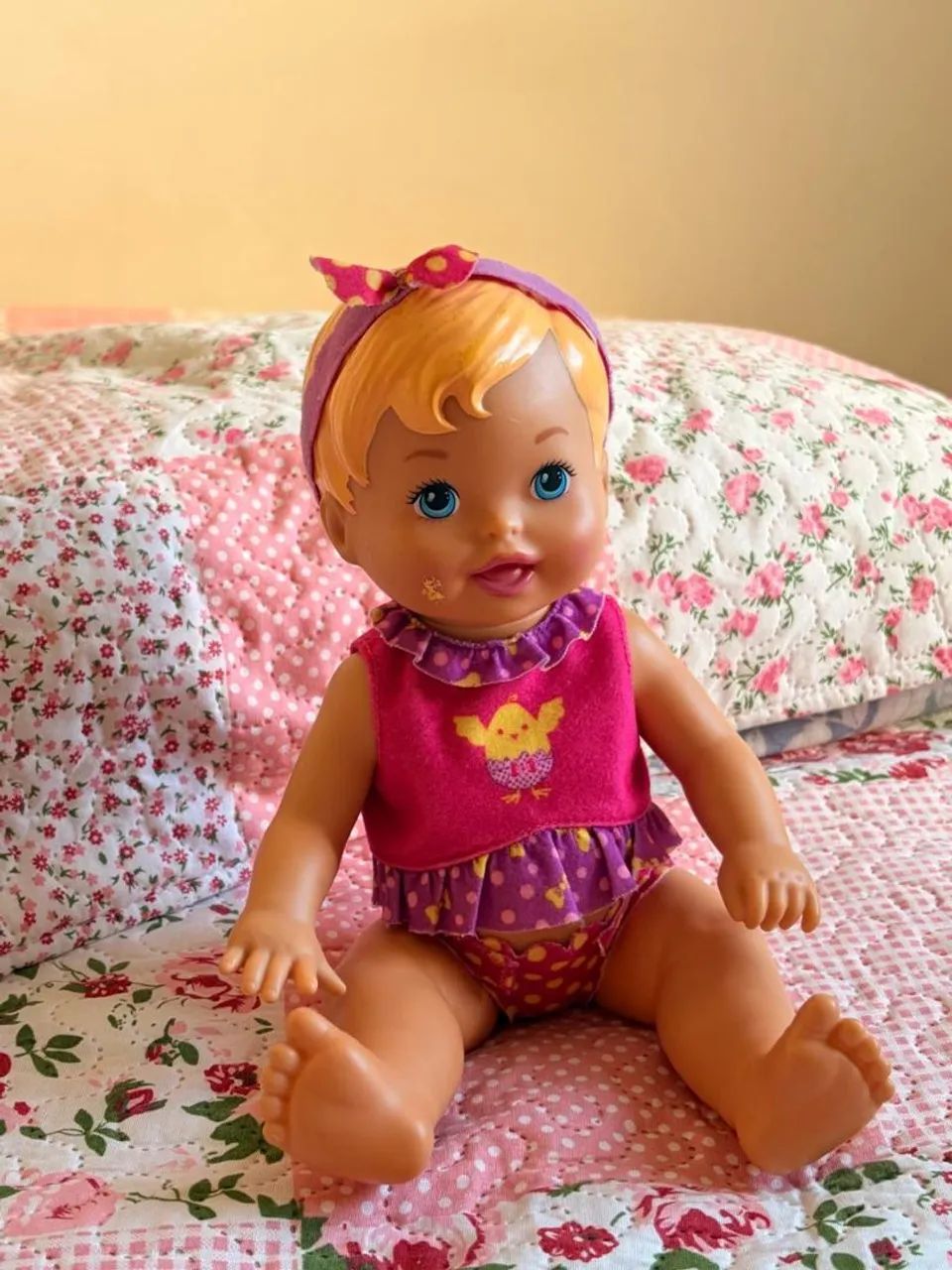 Baby alive com roupa rosa e roxa