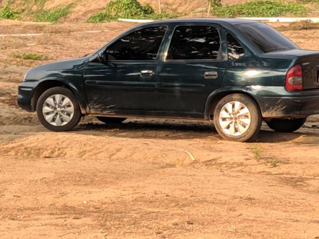 Troco carro Corsa classic em ágio de casa - Foto 2