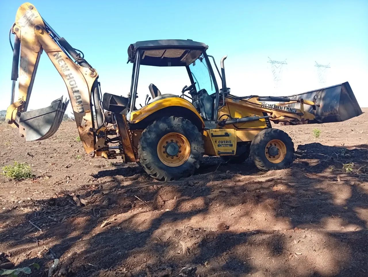 Retroescavadeira New Holland B95
