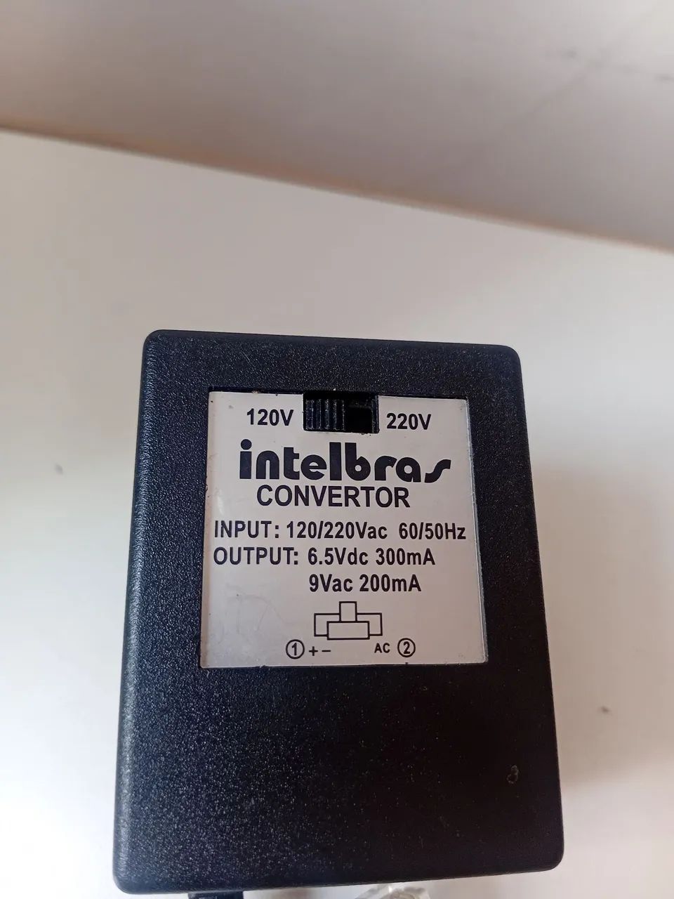 adaptador AC da marca Intelbras.  - Foto 2