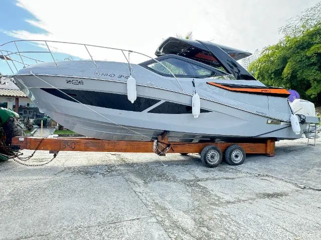 Lancha NHD 340 (32.5 nomenclatura internacional) com parelha popa Mercury 250hp 4T - Zero - Foto 13