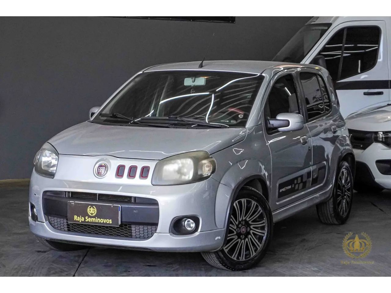 Fiat Uno Sporting 1.4 EVO Fire Flex 8V 4P 2012 - Foto 3