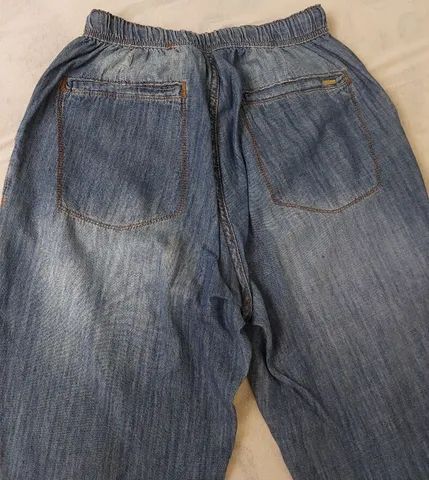 Calca jeans tamanho 42 estado de nova - Foto 5