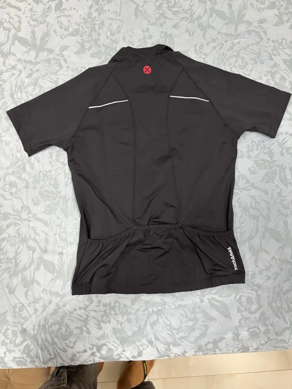 Camisa de Ciclismo Track & Field unissex preta com bolsos
