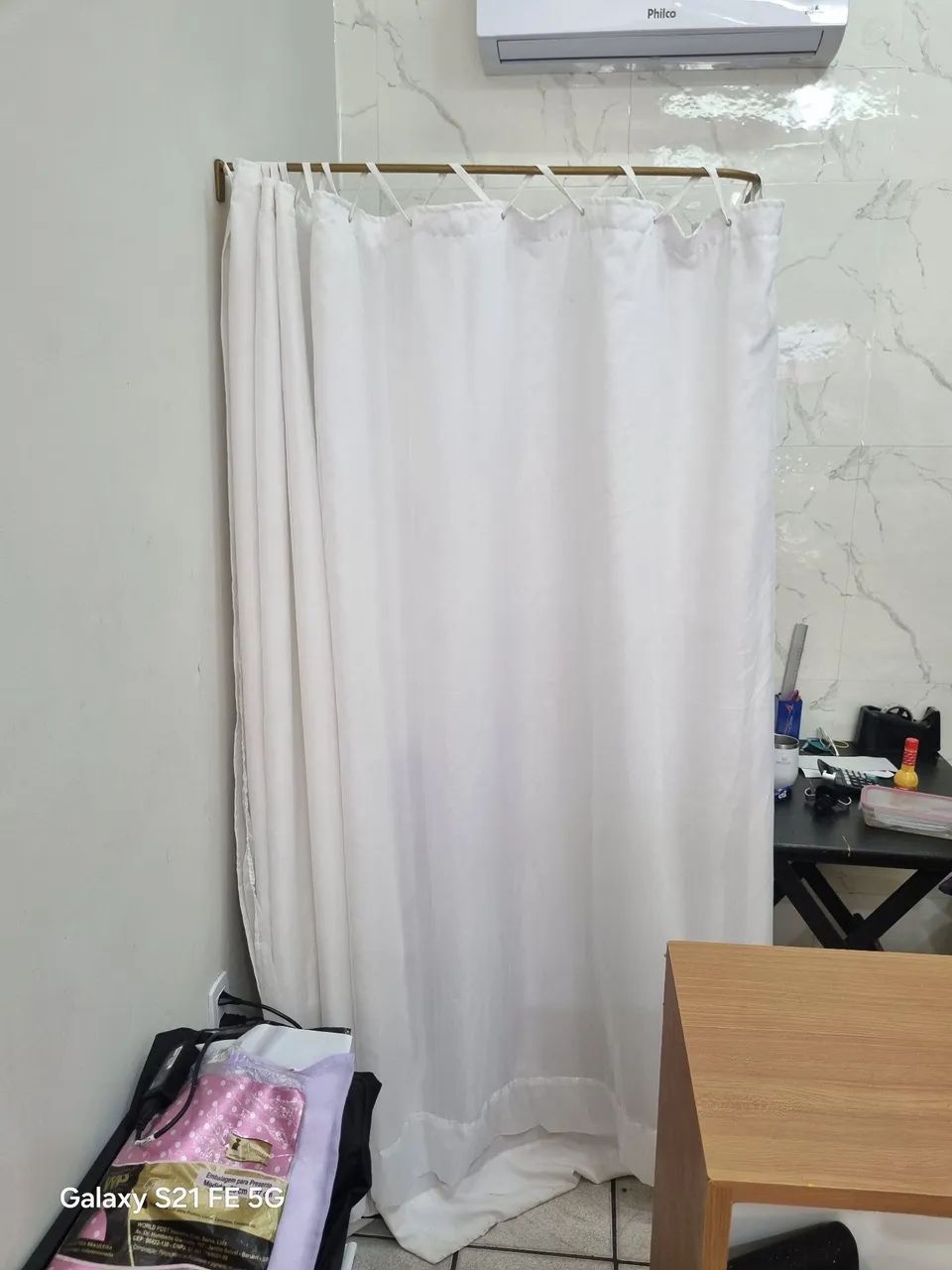 Provador de canto para loja