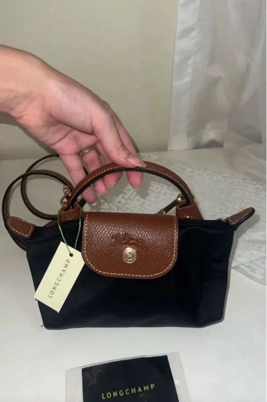 Longchamp Clutch Le Pliage preta