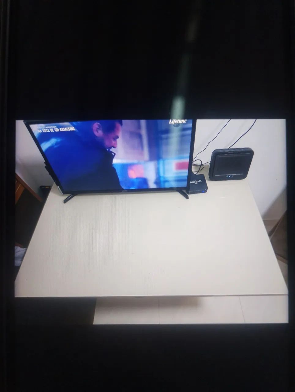 Mesa com tampo vidro com 4 cadeiras