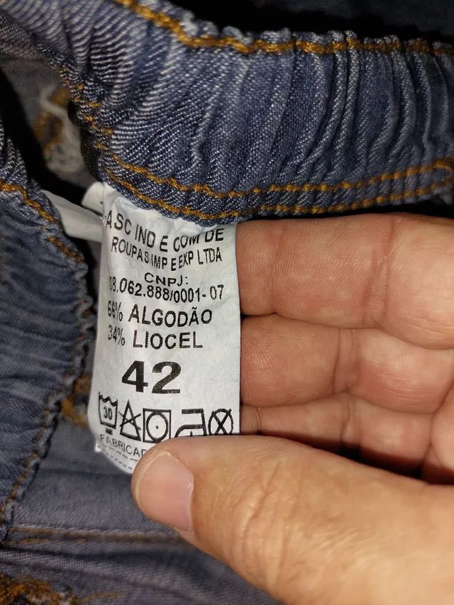 Calca jeans tamanho 42 estado de nova - Foto 2
