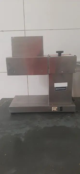 Máquina de amaciar bife
