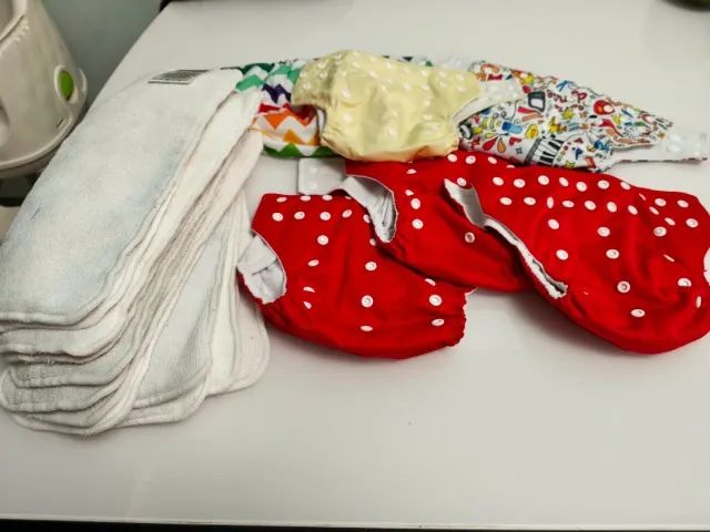 Kit com 6 fraldas ecológicas huggies - Foto 3