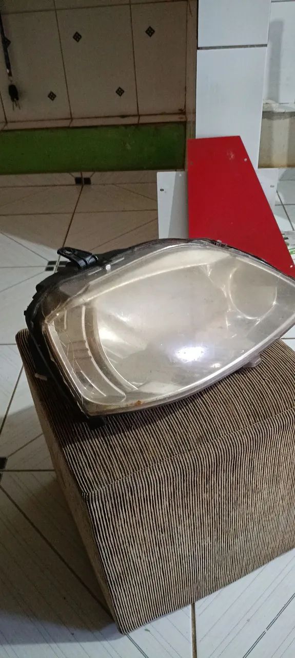 Farol do Logan 2012 usado