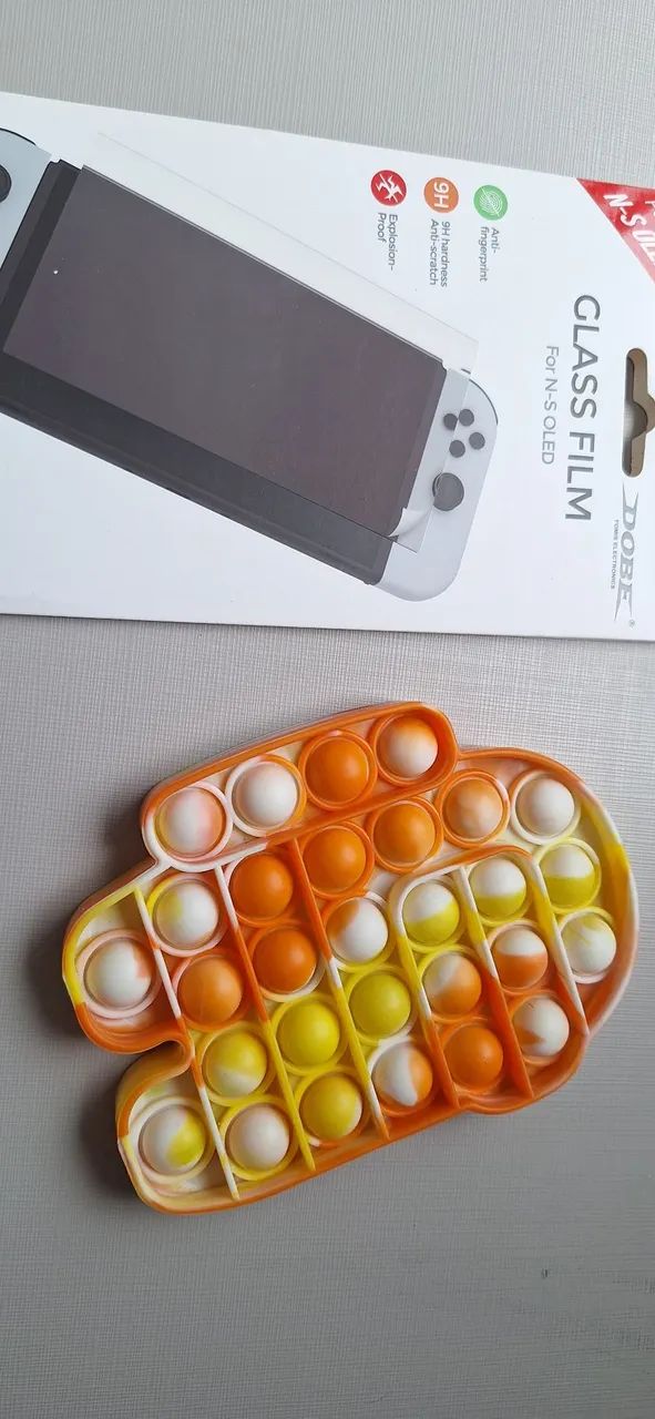 Nintendo Switch Oled película + Pop it Among us de extra
