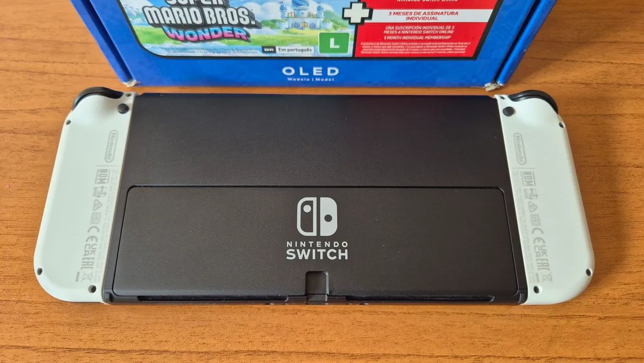 Nintendo Switch Oled desbloqueado + Caixa + Sd 128Gb - Foto 4