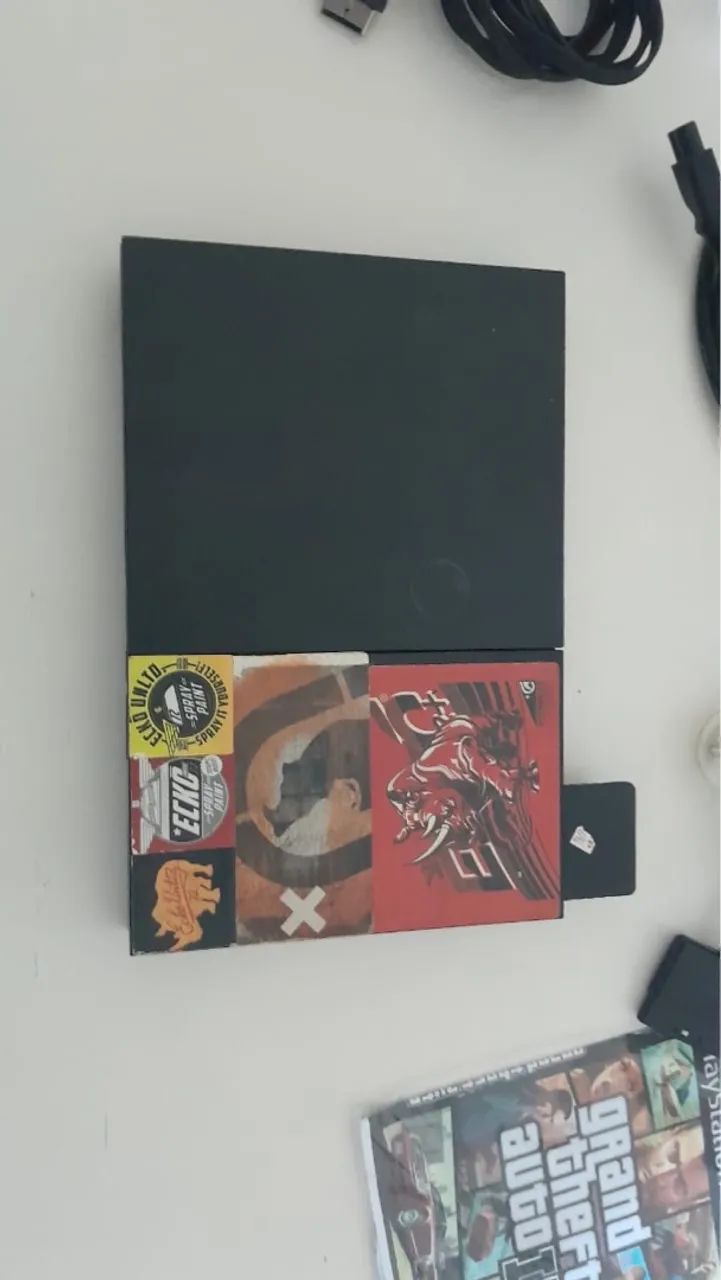 PS2 Slim com jogos e acessórios