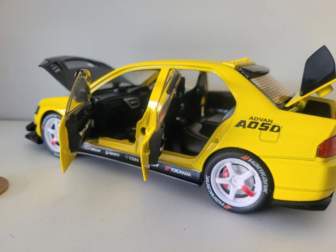 Miniatura Lancer Evolution 1/24, três cores - Foto 4