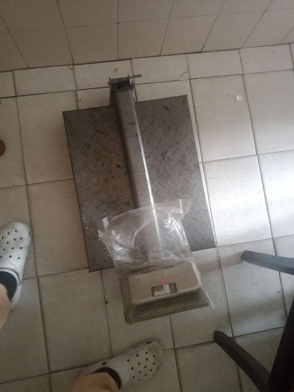 Balança de ferro velho