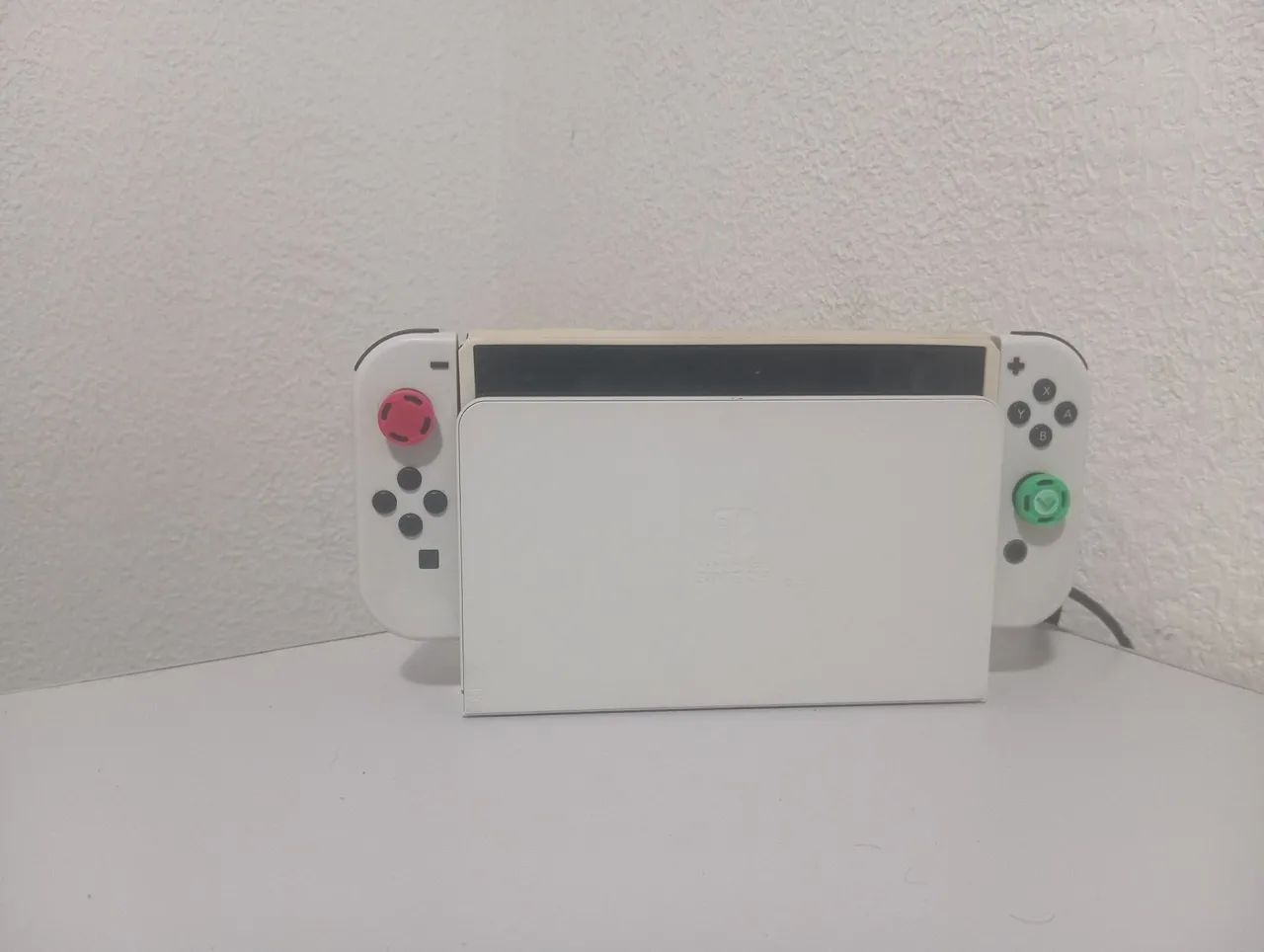 Nintendo Switch OLED 64gb + 128gb
