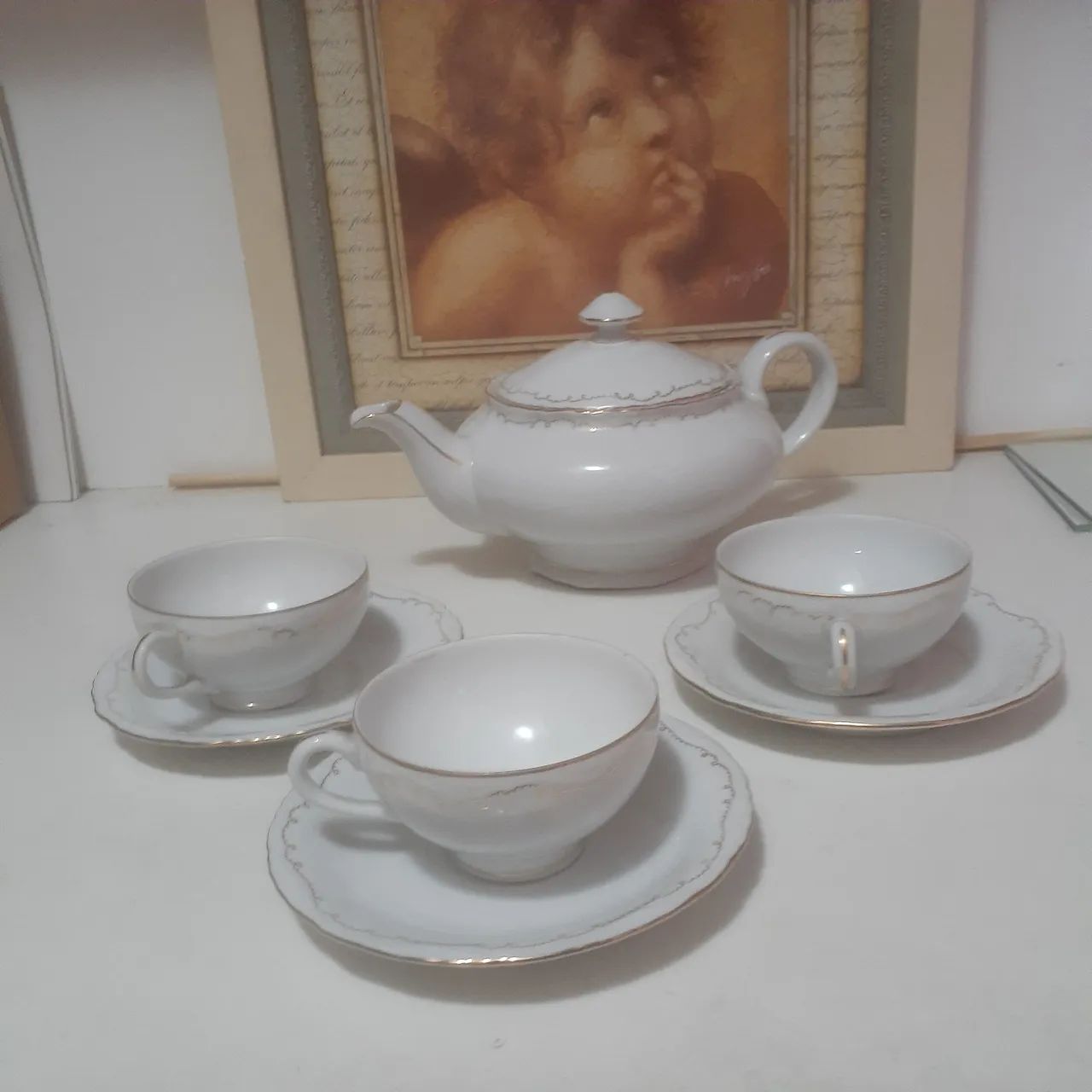 Jogo chá porcelana thun  Czechoslovakia 7 peças..filetadas